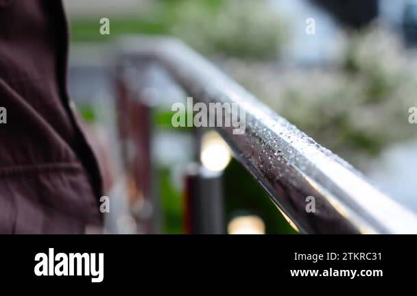 Looking over rail Stock Videos & Footage - HD and 4K Video Clips - Alamy