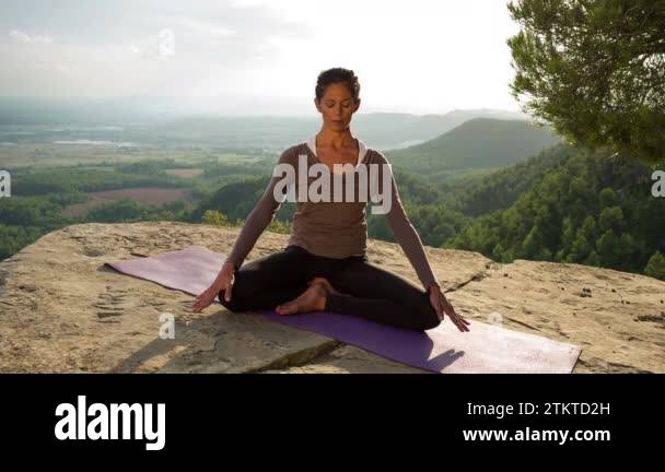 Female mountain top yoga Stock Videos & Footage - HD and 4K Video Clips ...