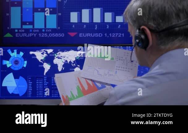 Trader looking data on screens Stock Videos & Footage - HD and 4K Video ...