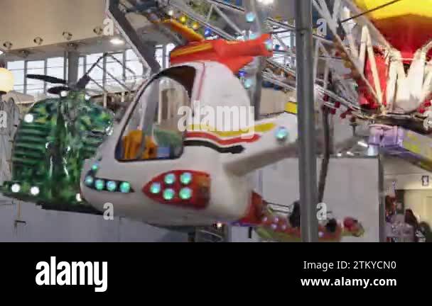 Spinning Helicopters Aircraft Carousel Kids Ride at Amusement Park in ...