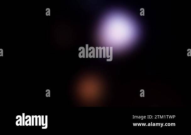 Stock Effects Rotating smoothly flashing multi-colored lights on a black background ...