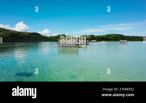 Manlawi Sandbar with floating cottages in Caramoan Islands. A floating ...