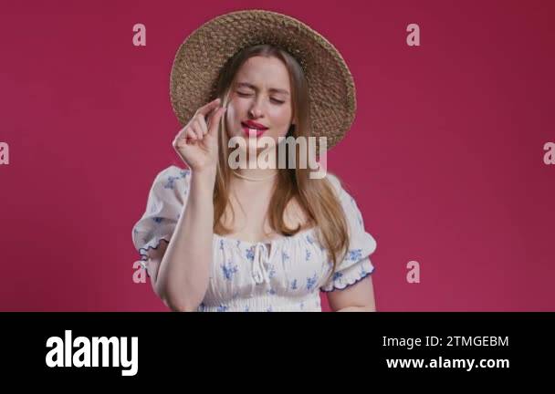 Young woman showing difference between invisible abstract subject or ...