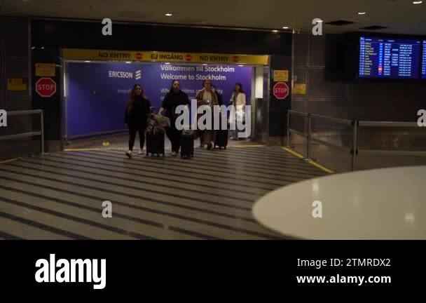 Arlanda, Sweden - 2023: Tourists Casually arriving in a rush after ...