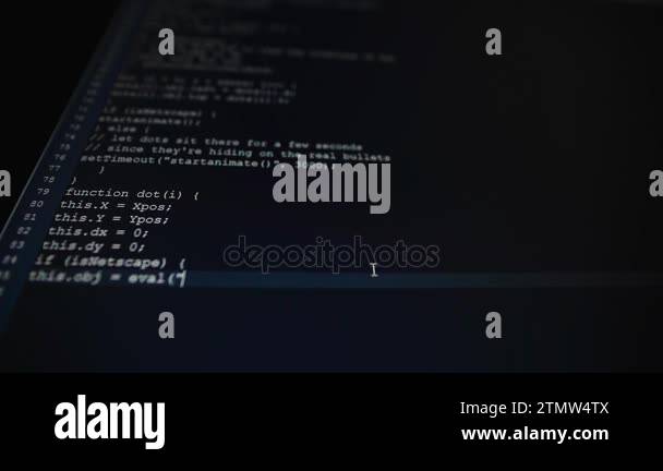 On a dark computer screen typing, probably some programmer type on the ...