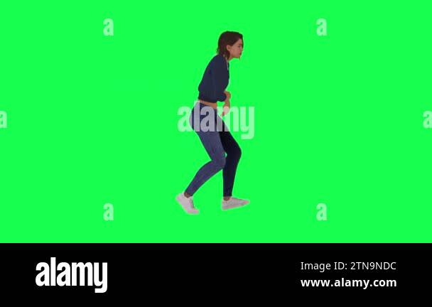 The injured woman running suddenly hits the wall and grabs her head ...