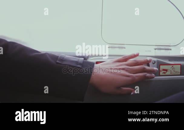 Woman hand open door lock in airplane. Unlock door inside airplane ...