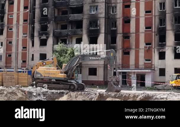 The destruction of a multi-storey building after being hit by an ...