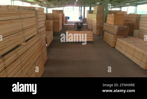 Modern sawmill. The concept of a modern sawmill. Forklift in stock ...