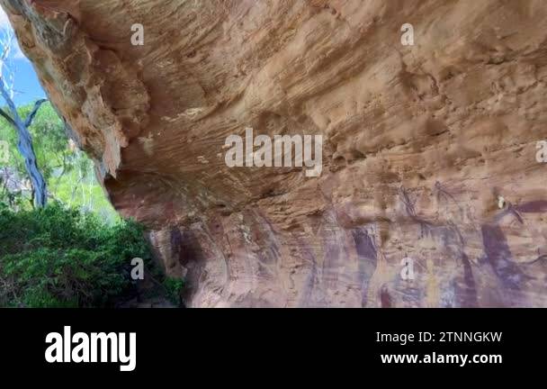 Qld Rocks CAPE YORK, QLD - JUNE 21 2023:Indigenous Australian rock art paintings ...