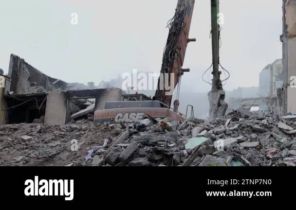 The destruction of a multi-storey building after being hit by an ...