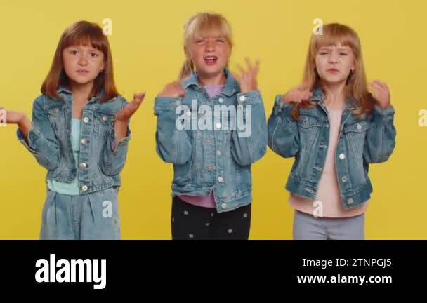 What. Why. Teenage girls raising hands in indignant expression, asking ...