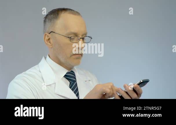 Doctor dialing mobile cell Stock Videos & Footage - HD and 4K Video ...