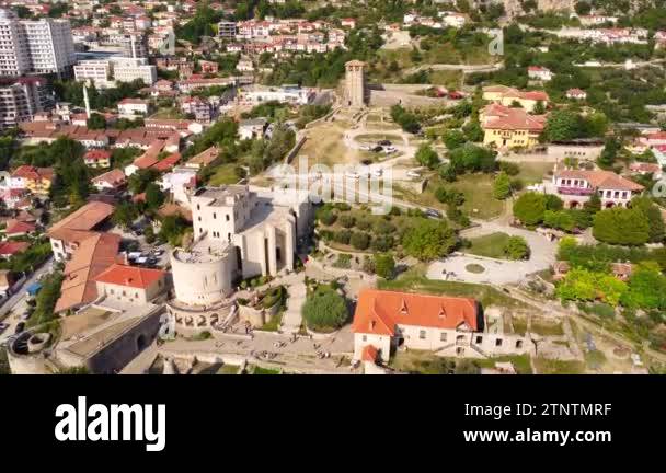 Kruje Castle and its fortress seen from an aerial drone view, tower and ...