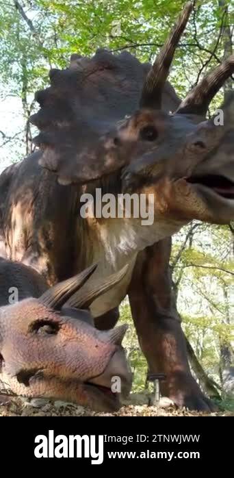 Scary, strange dinosaurs. Predatory dinosaurs stand in the middle of ...