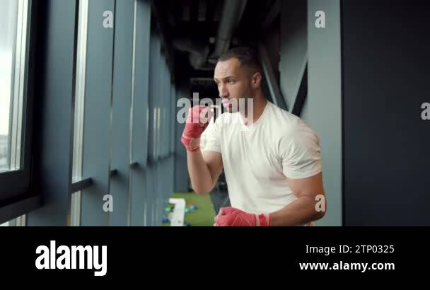 Boxer puts teeth mouth protection in combat sport. Boxer uses mouth ...