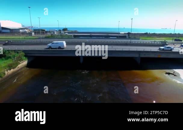 Aerial Drone And Canal With Water Pollution To Flow Table Bay And Cape Town For River To Sea