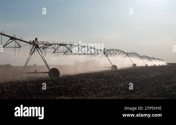 Agriculture irrigation system drop sprinklers Stock Videos & Footage ...