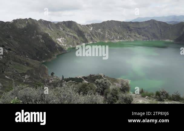 aerial of laguna quilotoa at the quilotoa loop in the andes mountains ...