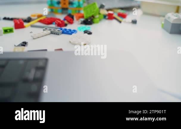 Robotics programming class. Children construct and code Robot. STEM ...