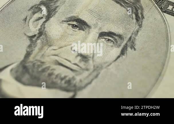 5 dollar bill with President Abraham Lincoln Stock Video Footage - Alamy