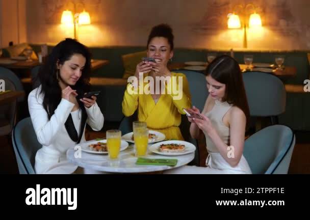 Using mobile phones dinner table Stock Videos & Footage - HD and 4K ...