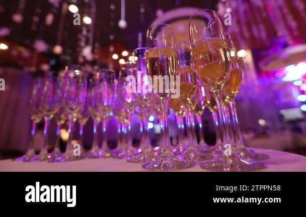Glasses with champagne on the table in the restaurant, glasses of ...