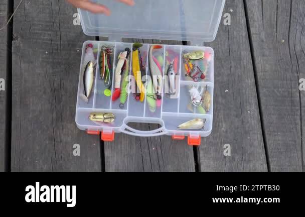 Woman Hand Open Large Fisherman S Tackle Box Takes One Bait and Closes the  Box. Case Fully Stocked with Lures and Stock Footage - Video of object,  jigging: 292642156