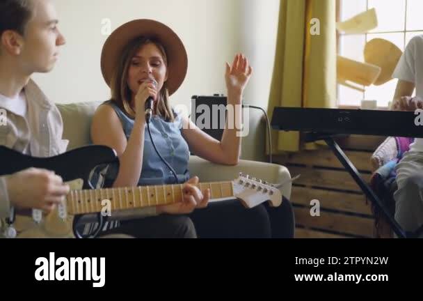 Friends playing musical instruments Stock Videos & Footage - HD and 4K ...