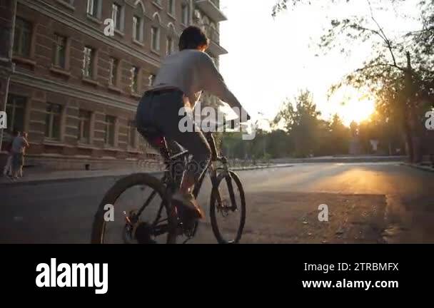 Back view young female rides Stock Videos & Footage - HD and 4K Video ...