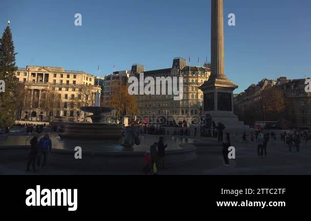 LONDON - circa 2017:People visit Trafalgar Square in London.One of the