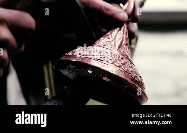 Smeth Work Traditional tinsmith work. Copper smith makes embossing artifacts from ...