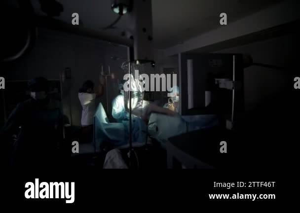 Surgeons team performing surgical operation,operating room. Is the ...