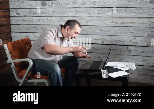 fifty year old crazy man checks online account and celebrates winning ...