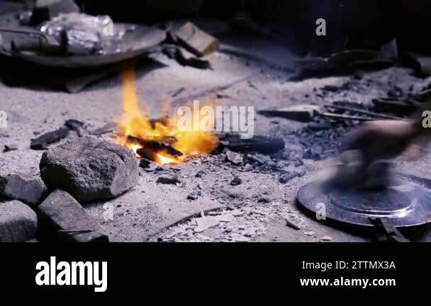 Smeth Work Traditional tinsmith work. Copper smith makes embossing artifacts from ...