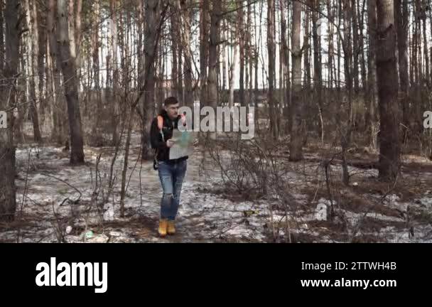 Map of wood Stock Videos amp Footage - A Traveling Man With Map In Wood 2ttwh4b 