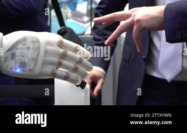 Human hand and robots as a symbol of connection between people and ...