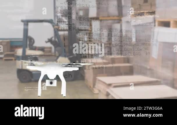 Digitally generated white drone flying in a warehouse. Background shows ...