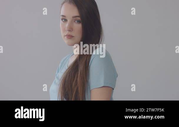 young baby face model in studio. Long straight hair blue eyed model ...