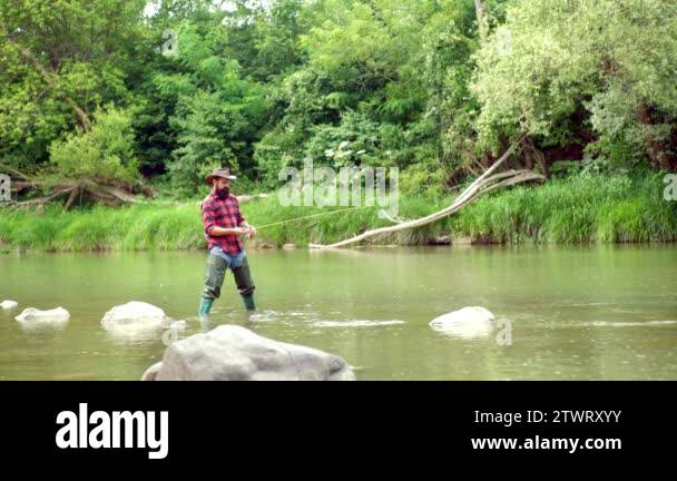 Angler catching fish on river Stock Videos & Footage - HD and 4K Video ...