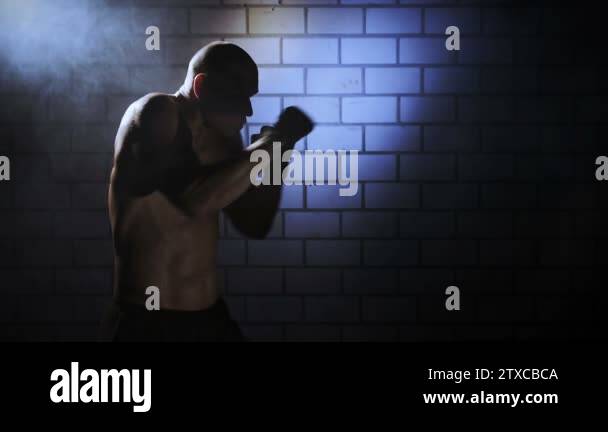 Boxing Shadow Player Kickboxer shadow boxing as exercise for the big fight Stock Video ...