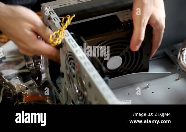 Assembly computer install power supply Stock Videos & Footage - HD and ...