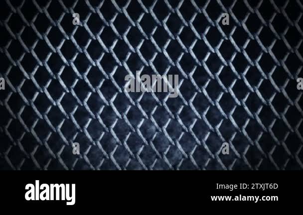 Metallic wire fence on a dark background. Chain of wire mesh steel ...