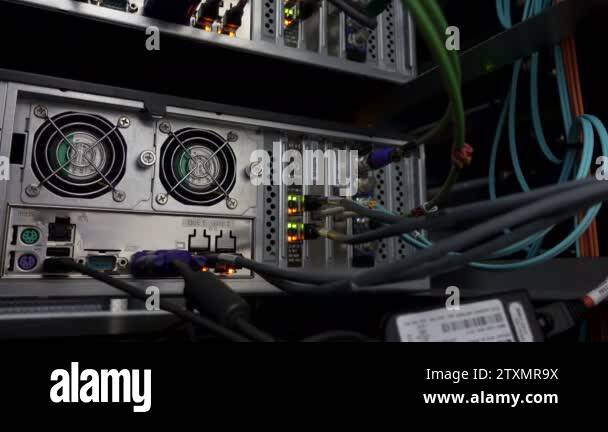 Back panel of powerful servers installed in the rack of the server room ...