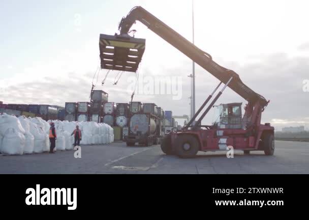 Crane operator and Mobile crane machine stand by waiting for lifting ...