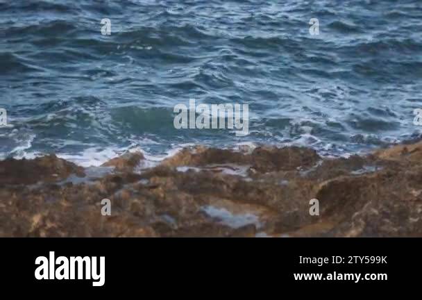 White tides crash against stones Stock Videos & Footage - HD and 4K ...