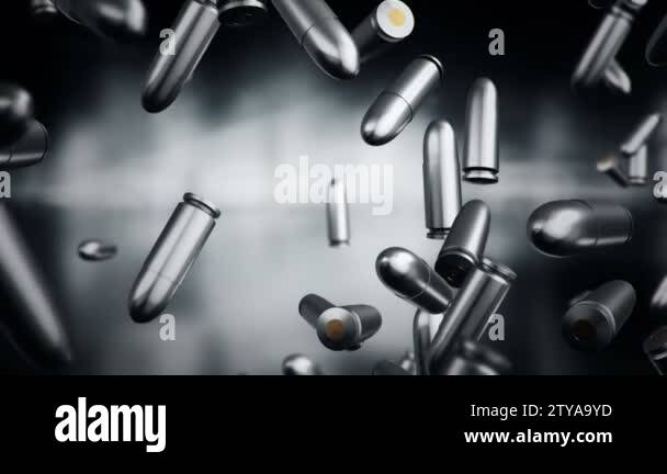 Animation falling of bullets different calibers on dark and blurred ...