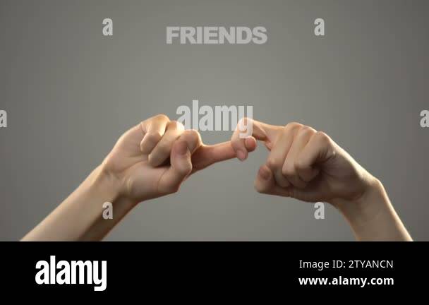 Friends hand signal Stock Videos & Footage - HD and 4K Video Clips - Alamy