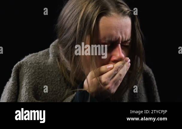 Imprisoned woman coughing, wrapping into old rag, tuberculosis, lungs ...