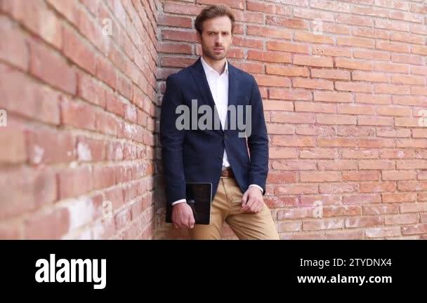 Serious smart casual man holding Stock Videos & Footage - HD and 4K ...